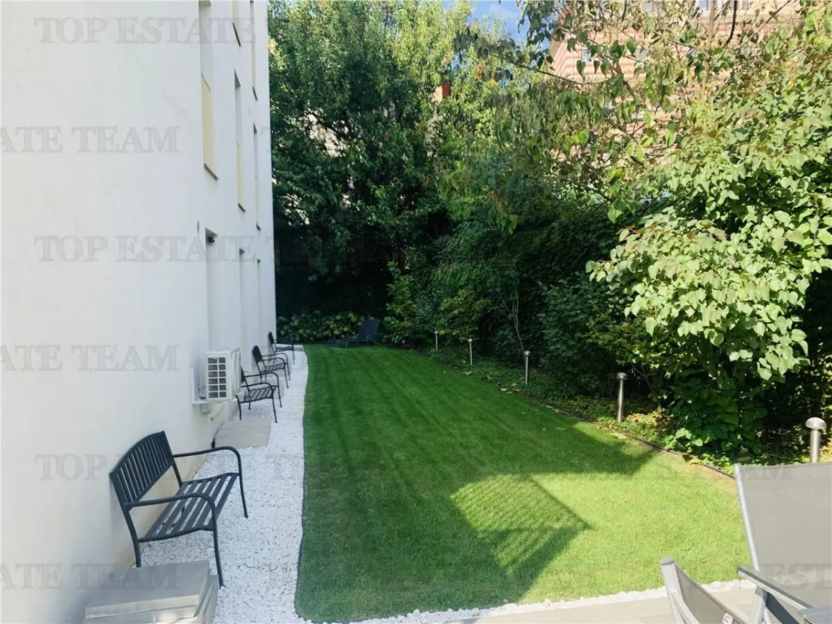 Apartament cu 4 camere de vanzare, Bulevardul Marasesti - Curte 277 Mp + 4 locuri de parcare - foto 11