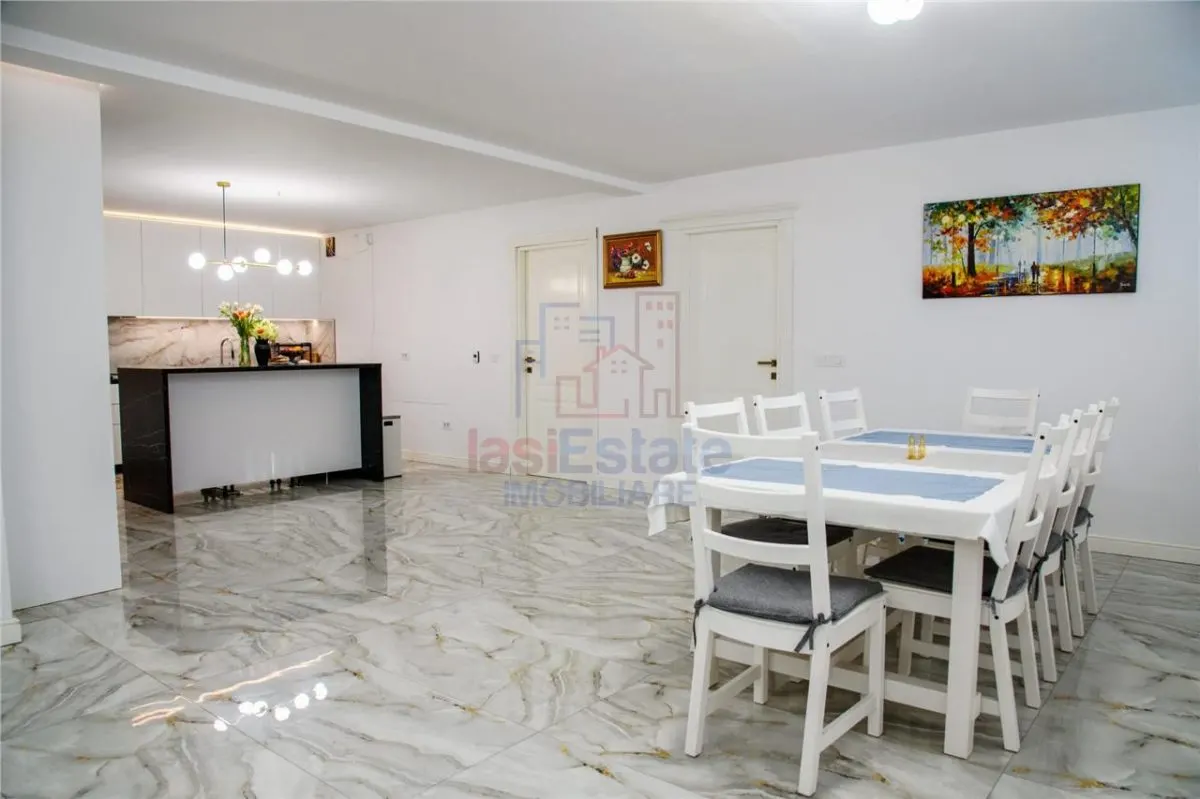 Casa intr-o zona linistita cu garaj si teren-1091 mp - foto 12
