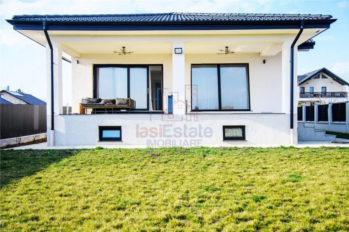 Casa intr-o zona linistita cu garaj si teren-1091 mp - foto 17