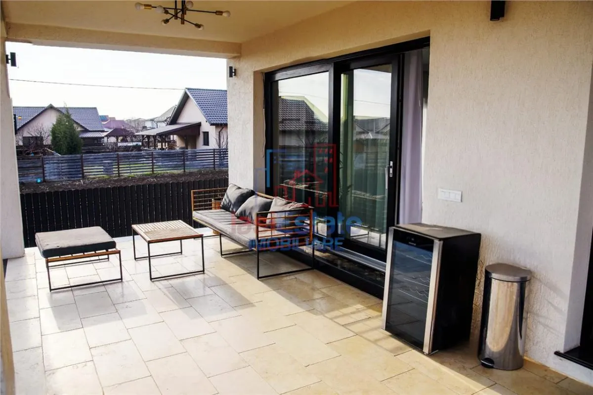 Casa intr-o zona linistita cu garaj si teren-1091 mp - foto 18