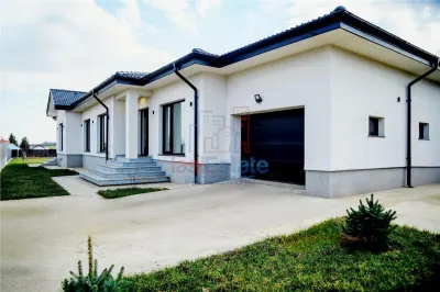 Casa intr-o zona linistita cu garaj si teren-1091 mp - foto 20
