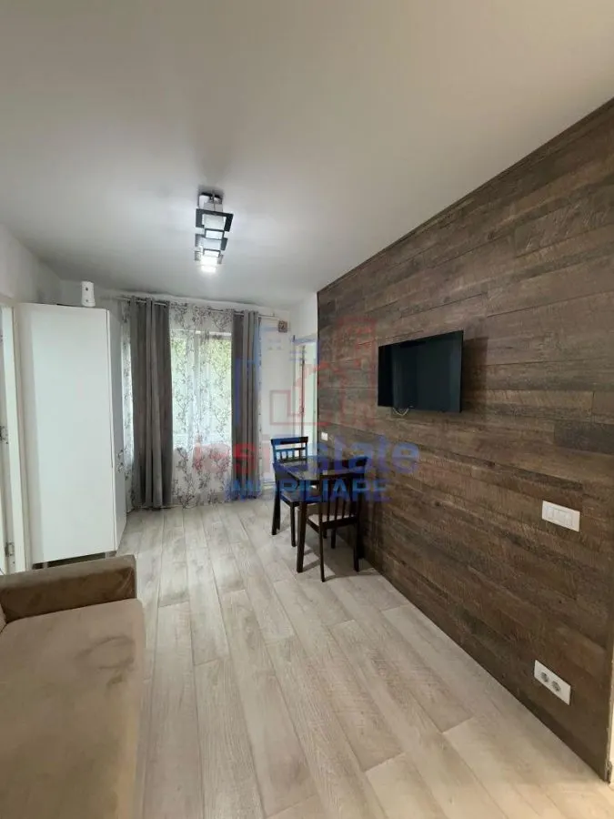 Apartament cu 2 camere de vânzare în Tătărași - etaj 1, centrală proprie, mobilat și utilat - foto 1