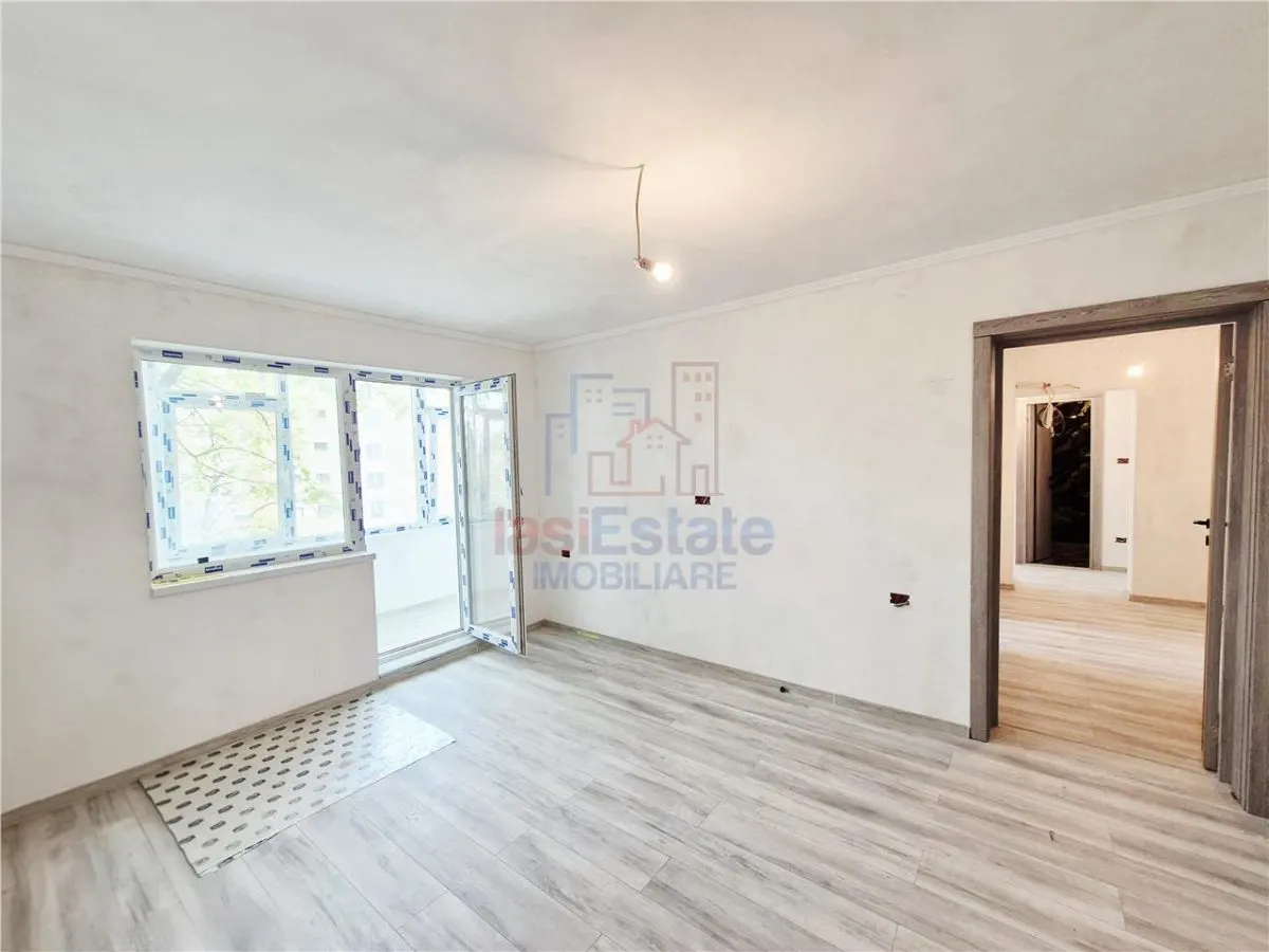Apartament cu 4 camere de vanzare - foto 1