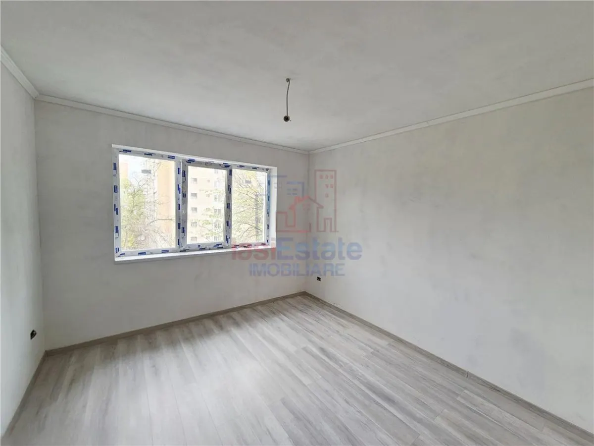 Apartament cu 4 camere de vanzare - foto 3