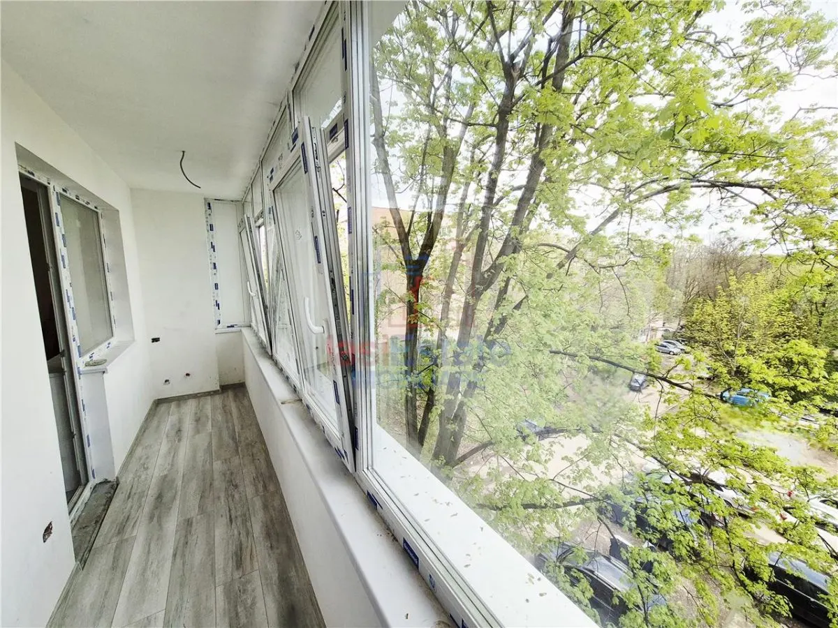 Apartament cu 4 camere de vanzare - foto 4