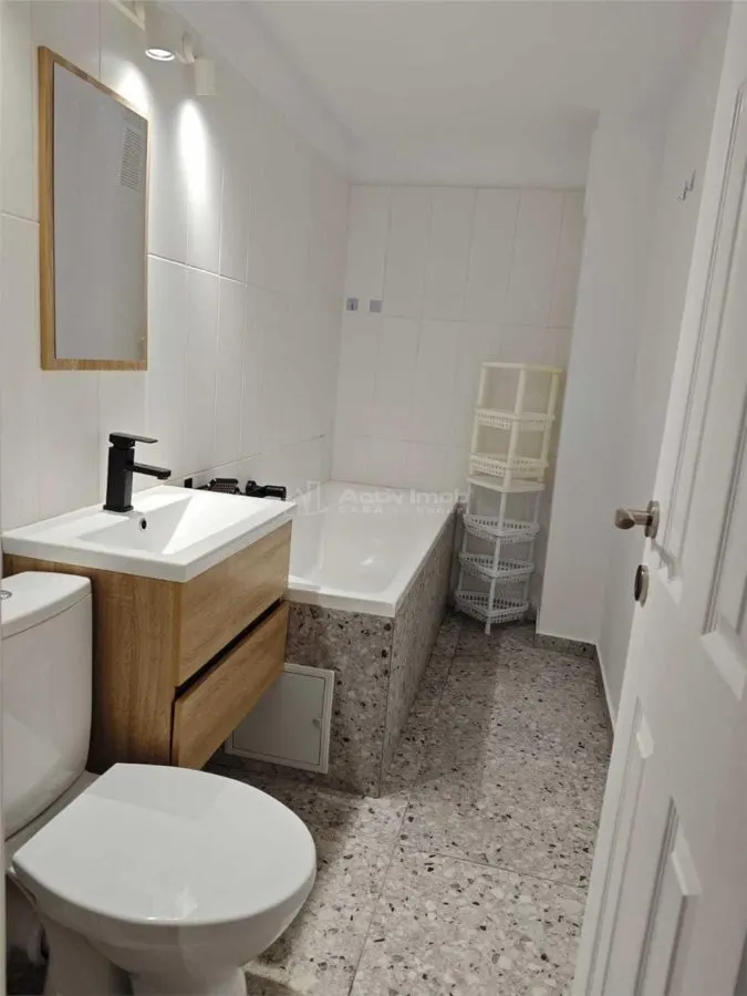 Apartamento 3 Dormitorios, Distribución Independiente, 56 m², Metro Brâncoveanu - foto 10