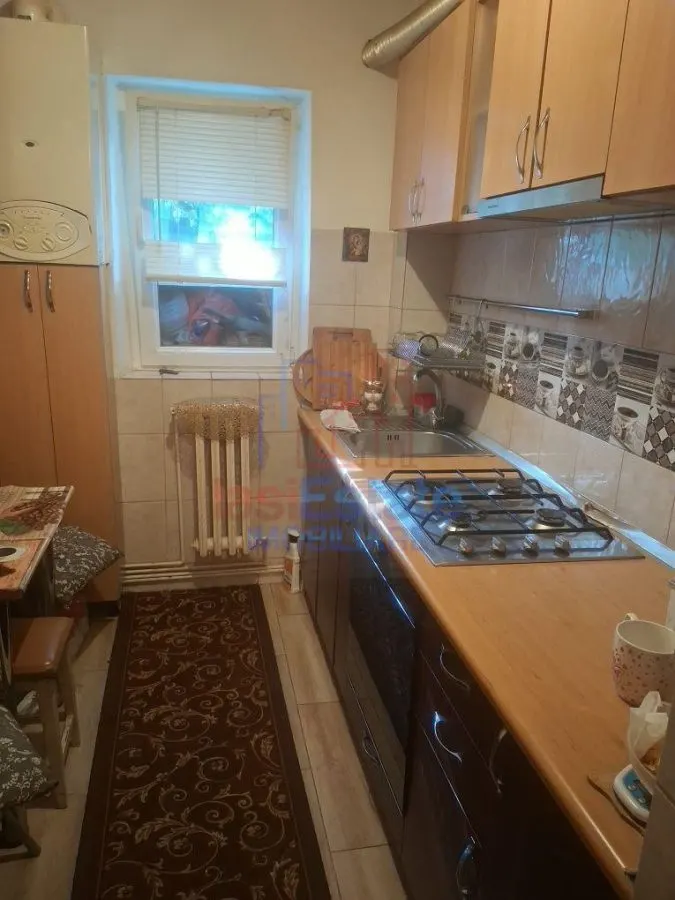 Apartament 3 camere, 53 mp, Alexandru cel Bun - Parter, centrala proprie, mobilat si utilat - foto 4