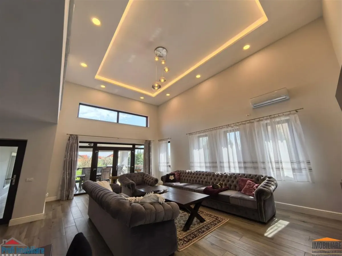 Vila impunatoare cu 6 camere spatioase in stil american - foto 1